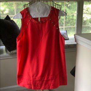 Sleeveless red blouse for work or play!